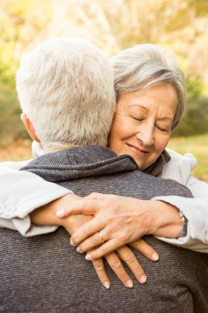 istock Senior couple in the park 664716424