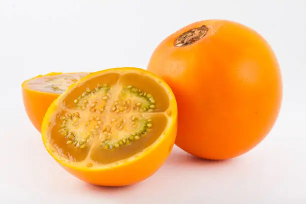 Lulo (Solanum quitoense) on white background