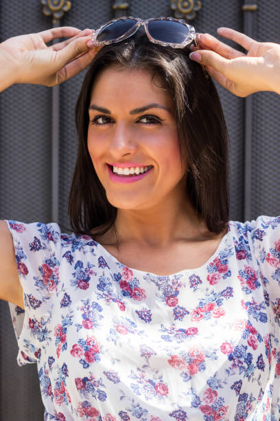istock Woman wearing sunglasses 664748006