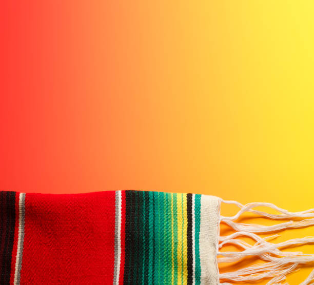 istock Mexican Blanket On Bright Yellow Background 664748368