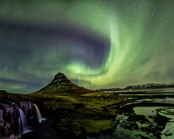 istock Northern Light Aurora borealis at Kirkjufell Iceland 664756016