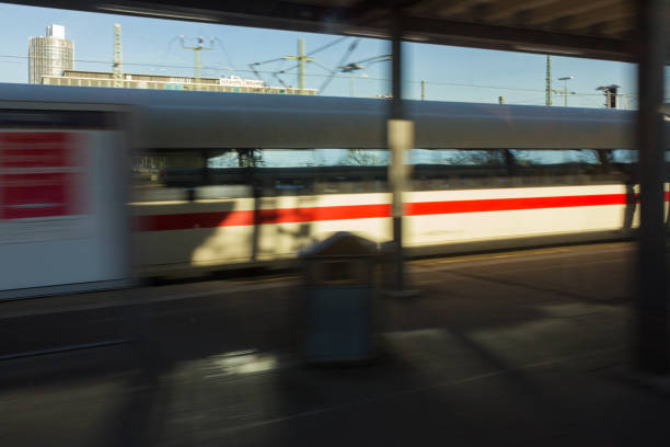 istock trainstation with symbols and travellers 664758372