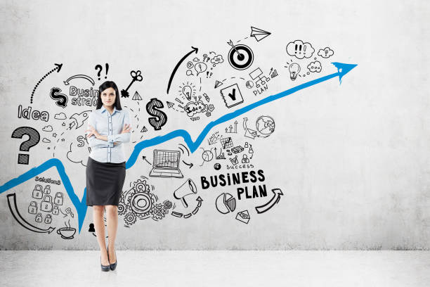 istock Black haired woman and business plan 664761774