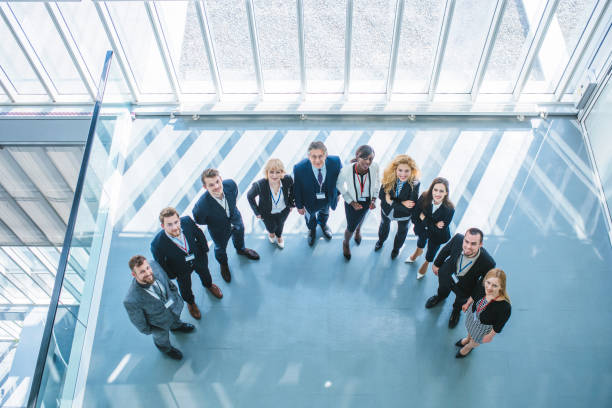 Great minds together Group photo of business team. Shot from above. organized group photos stock pictures, royalty-free photos & images