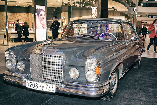 Moscow, Russia - April 02, 2017: Mercedes-Benz W111 280SE Coupe, Germany, 1970. Retro car exibition in shopping mall Metropolis.