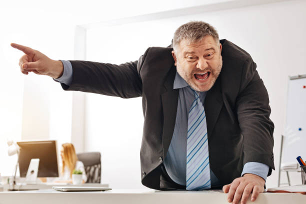 istock Stressed out employee shouting at his fellow office worker 664768412