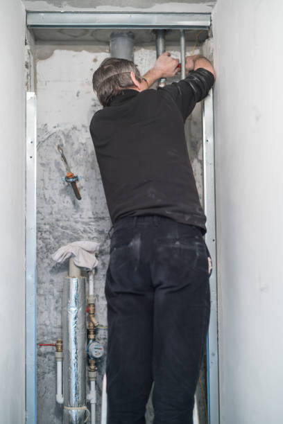 istock 70-years-old active senior man, construction worker - plumber, working for home renovation 664776062