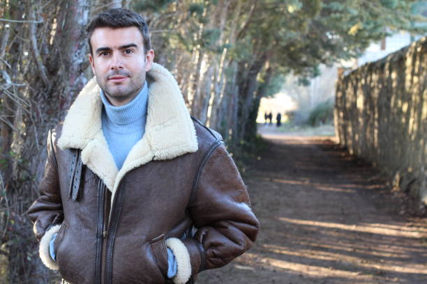 istock Handsome man wearing warm clothing with copyspace 664778466
