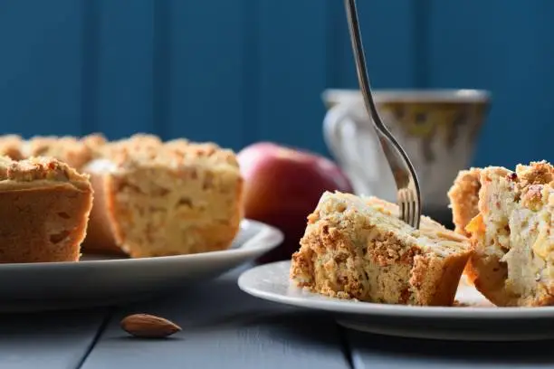 Homemade yummy wholegrain almond cake with apples closeup
