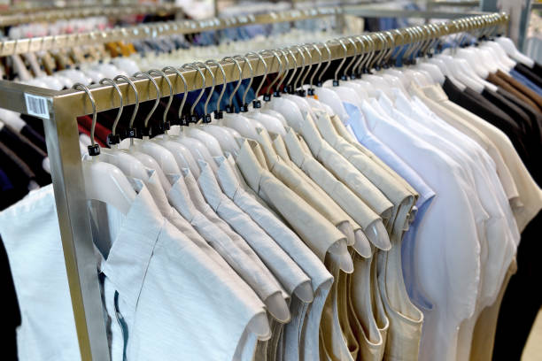 istock Clothes collection in hangers for sale. 664778966