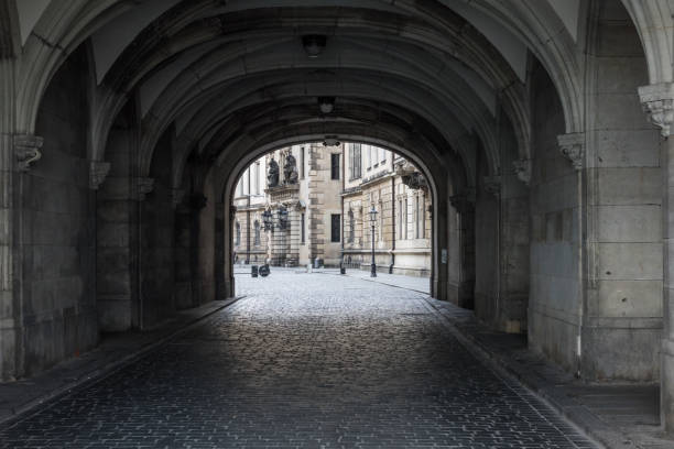 istock Dark stone street  in an old town Dresden 664779096