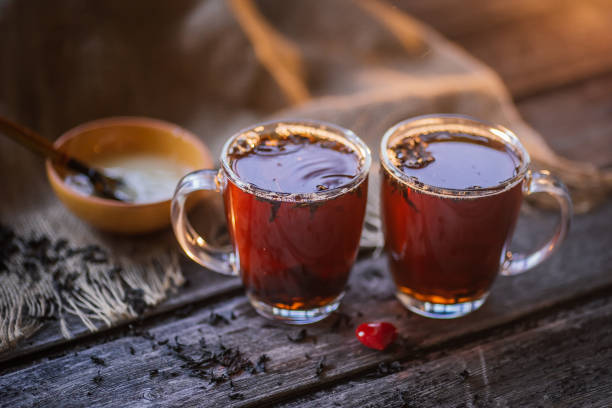 istock tea milk wood background 664781878