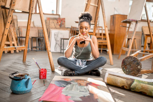 istock Creative student painting at the university 664782416