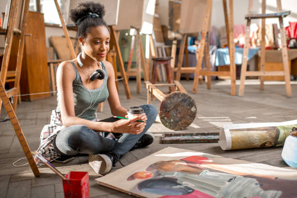 istock Creative student painting at the university 664782586
