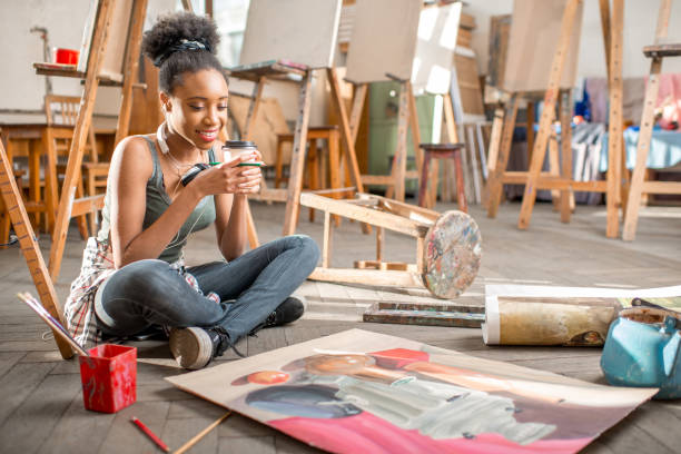 istock Creative student painting at the university 664782610