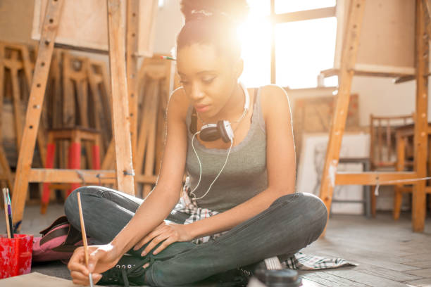 istock Creative student painting at the university 664782714