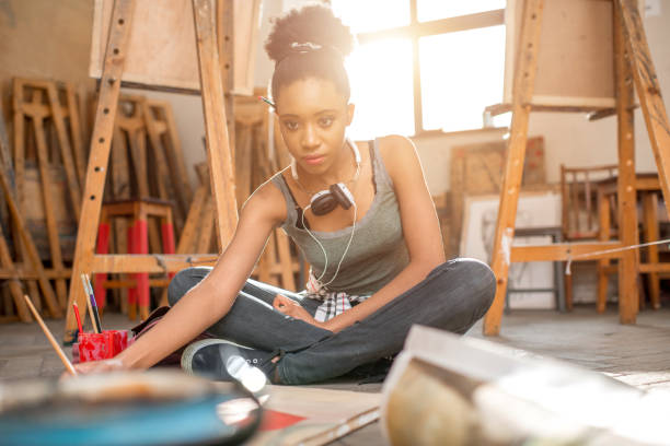 istock Creative student painting at the university 664782722