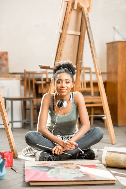 istock Creative student painting at the university 664785564
