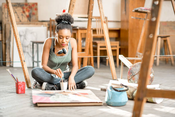 istock Creative student painting at the university 664785690