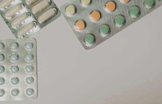 istock Medicines on a gray background of a different color 664789900