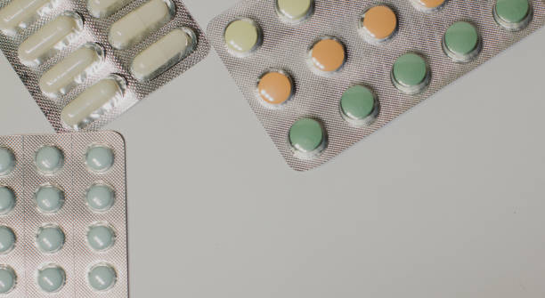 istock Medicines on a gray background of a different color 664789946