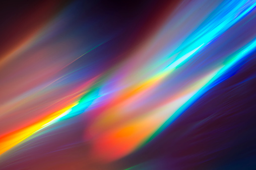 Colorful light beams as a background
