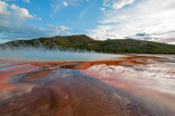istock Grand Prismatic Spring under sunset cloudscape in the Midway Geyser Basin in Yellowstone National Park in Wyoming USA 664797090