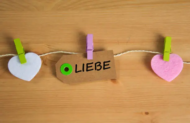 Liebe inscription written on paper tag