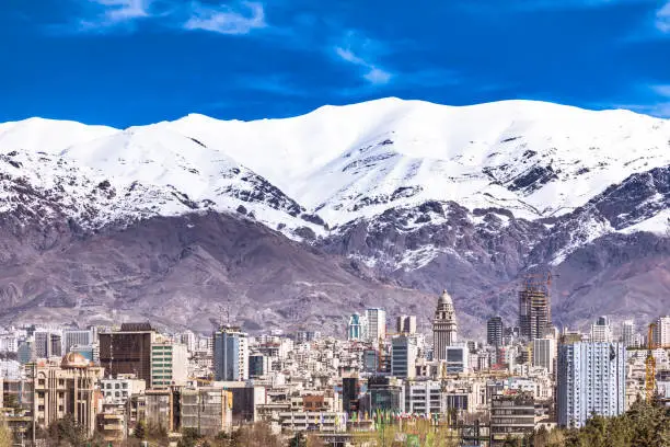 Tehran North Alborz mountains in spring with snow at the top