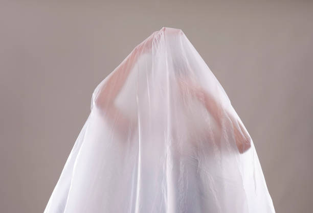 istock woman behind foil 664804240