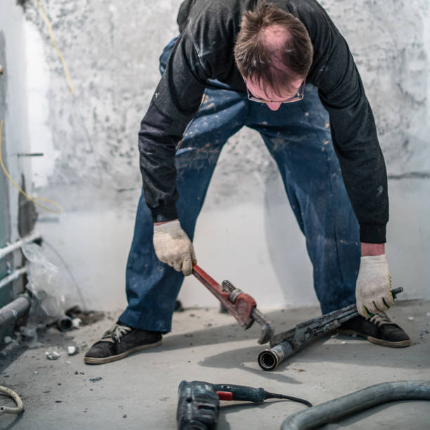 istock 30 years old man, manual worker - plumber, working with pipes for home renovation 664814302