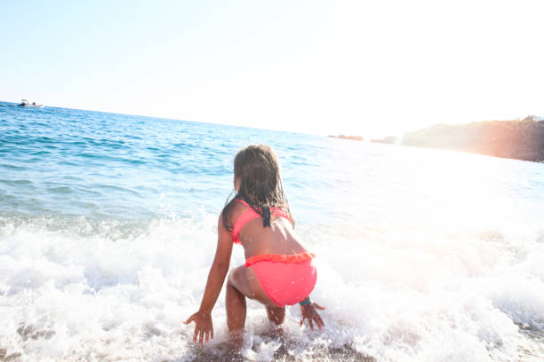 istock Happy Girl at the Beach 664814932