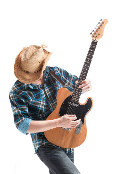 istock blues or country guitarist isolated on white 664823916