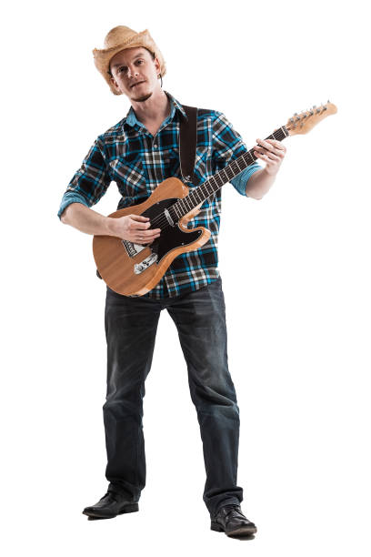 istock blues or country guitarist isolated on white 664824096