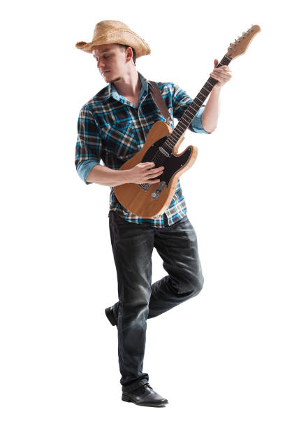 istock blues or country guitarist isolated on white 664824140