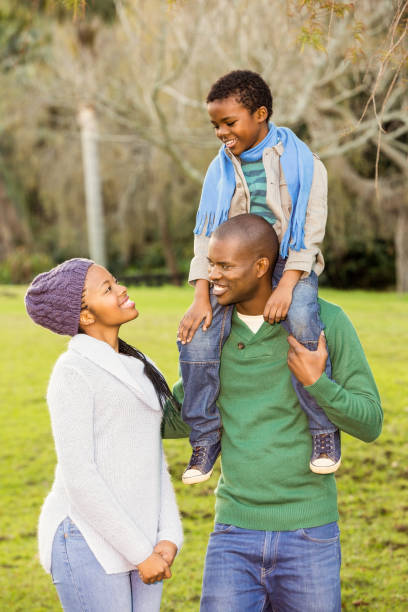 istock Happy family in the park 664827876