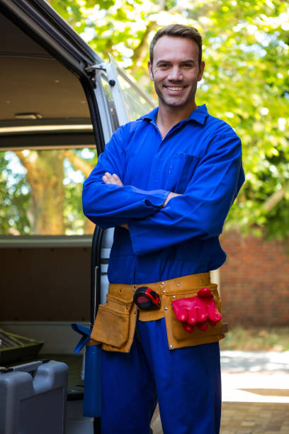 istock Mechanic with a tool belt around waist 664834218