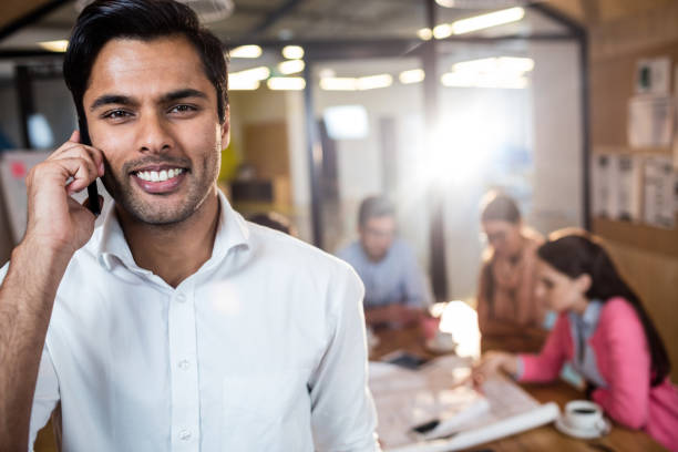 istock Casual businessman making a phone call 664834824