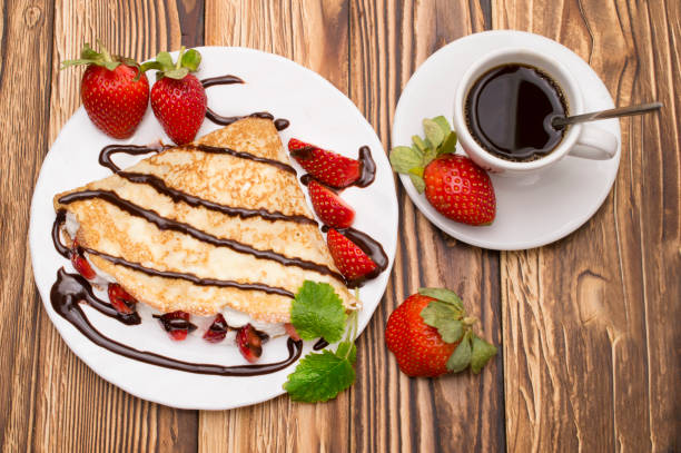 istock Crepes with Banana and strawberries 664835500