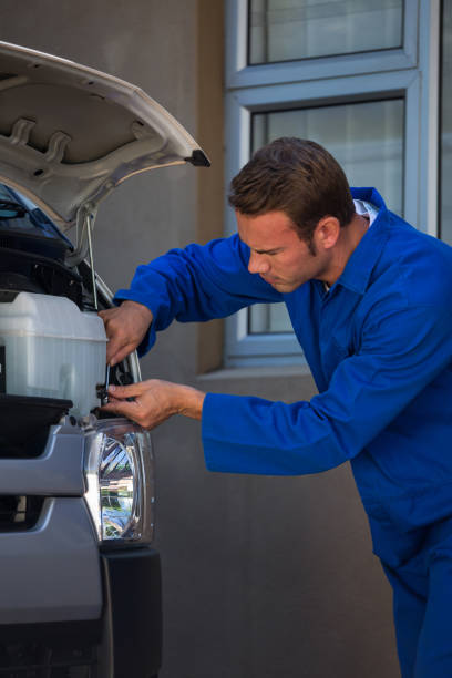 istock Mechanic examining the car 664835580