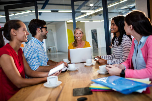 istock Casual business team having a meeting 664842290