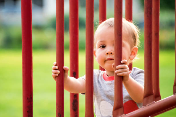 istock male toddler at the playground 664845304