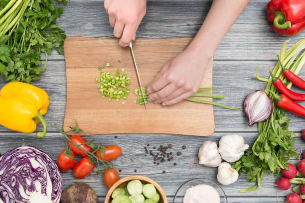 istock Slicing, chopping and peeling the vegetables cook. 664845828