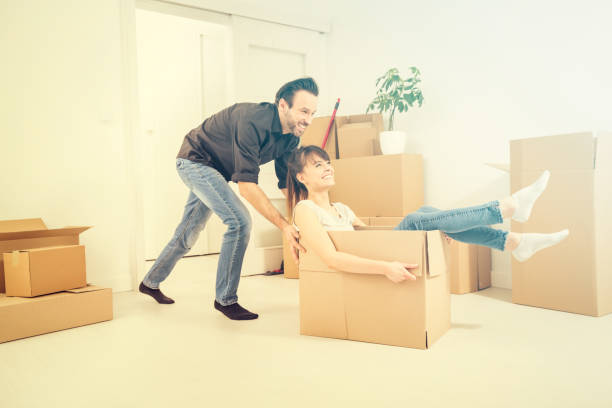 istock Young people move into a new apartment. 664846100