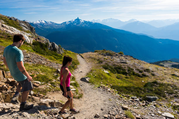 istock Couple on a stunning hike in the mountains 664846354