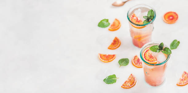 istock Homemade blood orange lemonade with mint and ice 664849280