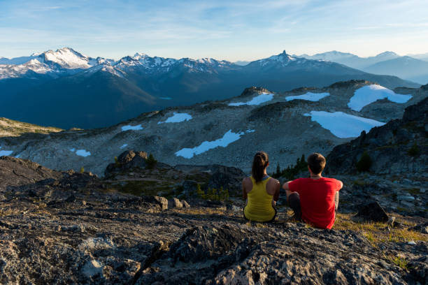 istock Couple on a stunning hike in the mountains 664849434