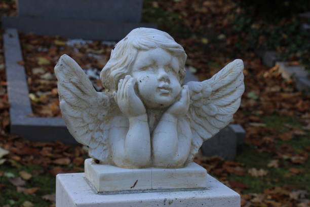 istock Guardian angel grave ornament 664850584