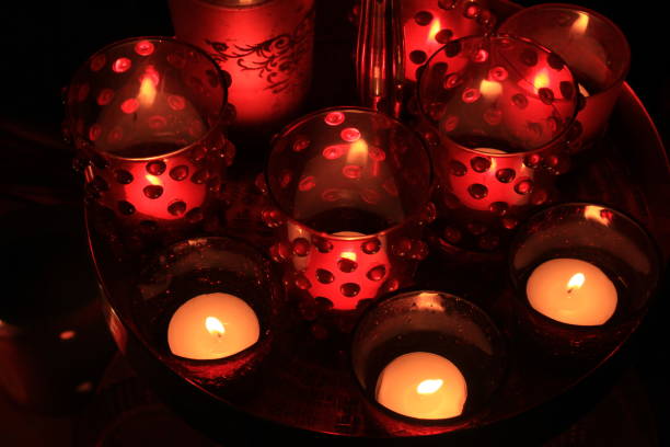 istock Red votives and candles 664850792