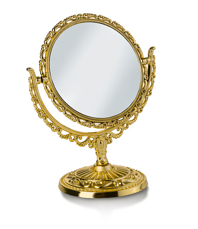 gold makeup mirror isolated on white background